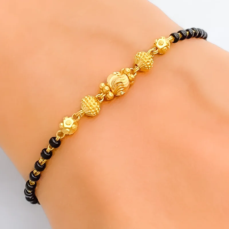 Shimmering Graceful 22k Gold Black Bead Bracelet