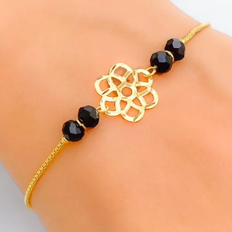 Dazzling Flower 22k Gold Black Bead Bracelet