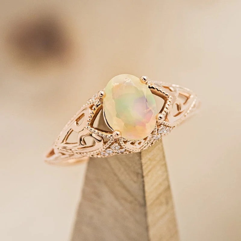 "RELICA" - OVAL WELO OPAL ENGAGEMENT RING WITH DIAMOND ACCENTS