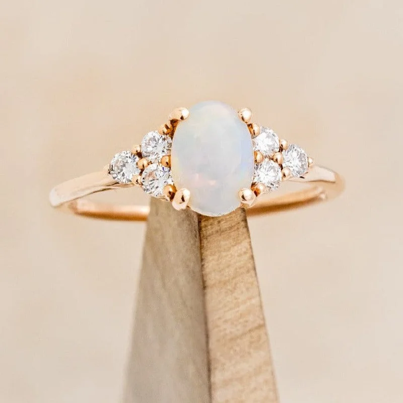 "RHEA" - OVAL CABOCHON CUT WHITE OPAL ENGAGEMENT RING WITH DIAMOND ACCENTS