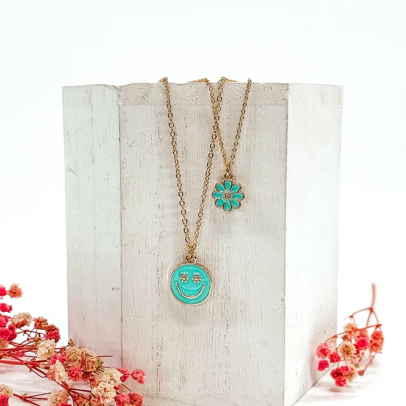 Double Layered Gold Necklace with Flower and Happy Face Pendant in Aqua